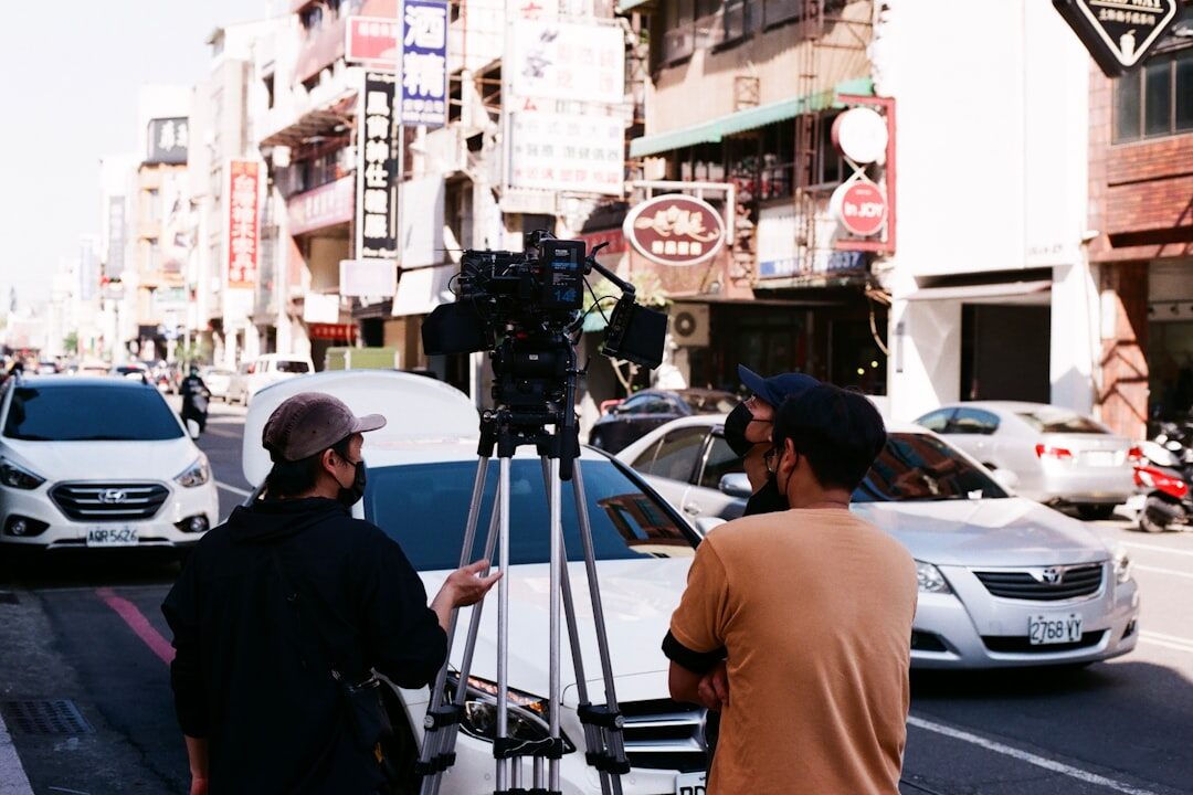 Reporter delivering a live broadcast from a location in a city